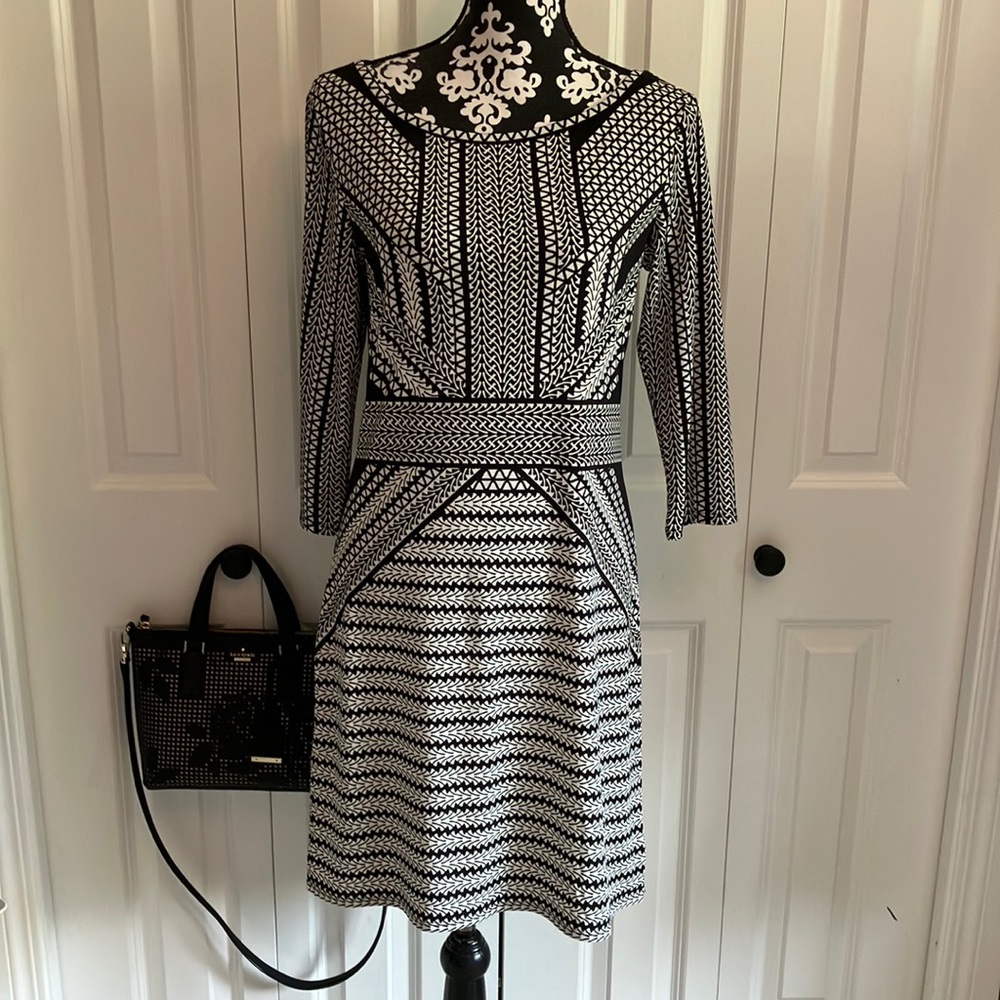 Black and white dress with fabulous contrasting pattern detail and 3/4 details.